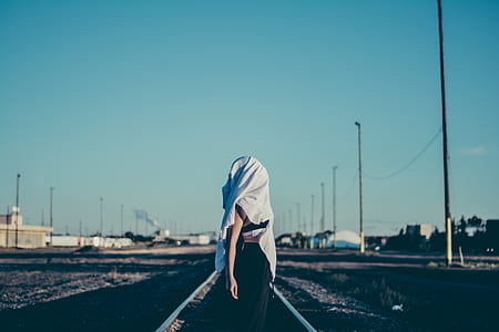 woman covered with white textile thumbnail