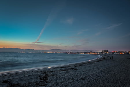 calm sea and gray shore during daytime thumbnail