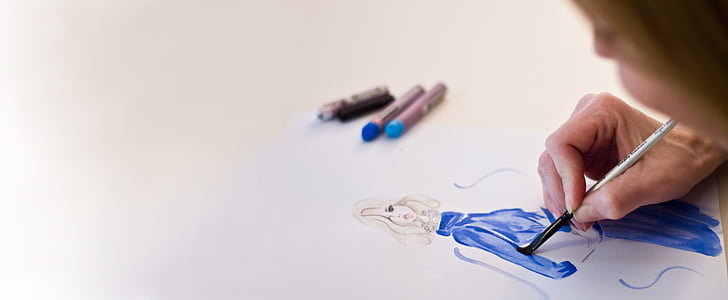 person painting on white printer paper thumbnail