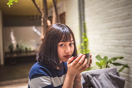 Woman Holding Food Bowl thumbnail