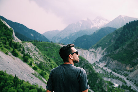 man wearing gray t-shirt with black framed sunglasses thumbnail
