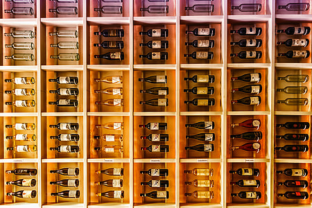 Wine bottles being kept in large rack for storage thumbnail