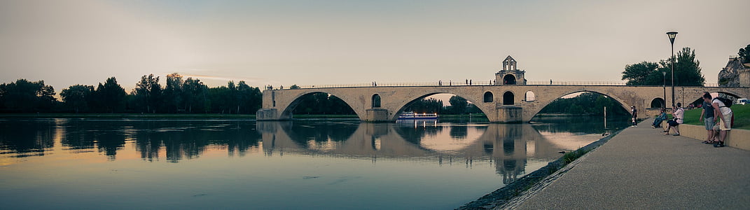 brown bridge and body of water thumbnail