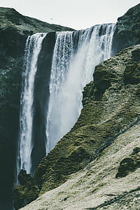 waterfall under white sky thumbnail