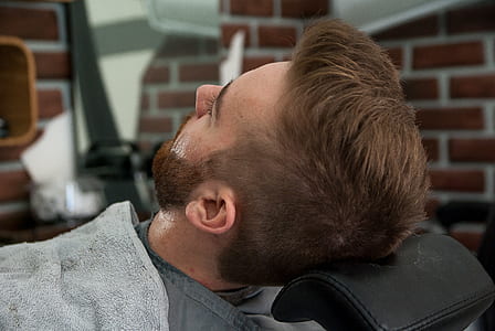 man covered in gray blanket thumbnail