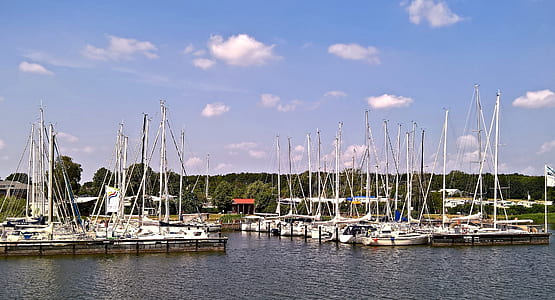 sailing boats on body of water thumbnail