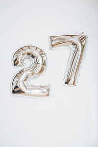 silver 27 inflatable balloon on wall thumbnail