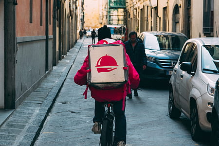 man riding bicycle on street during daytime thumbnail