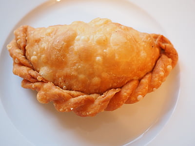 croisant on round white plate thumbnail