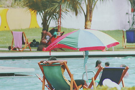 green, red, and brown umbrella thumbnail