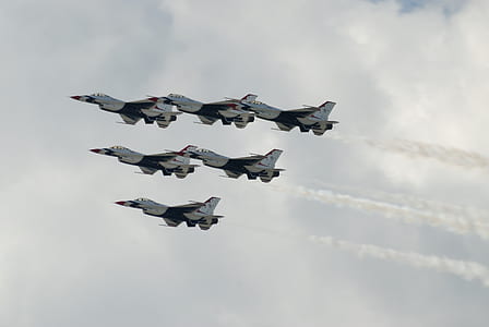 low angle photo of fighter plane air show thumbnail