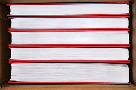 pile of red-and-white books thumbnail