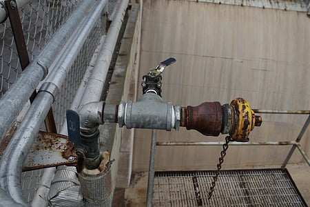 black ball valve on gray metal pipe thumbnail