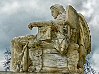 person sitting statue thumbnail