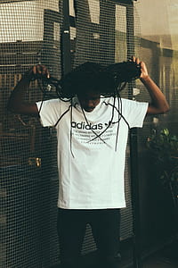 man holding his hair thumbnail