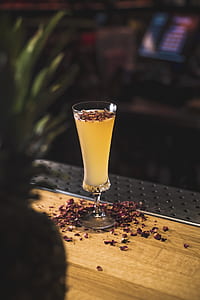 shallow focus photo of clear footed glass cup thumbnail