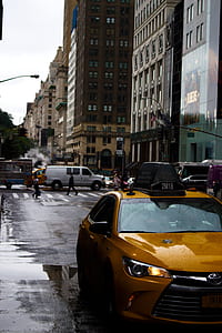 brown Toyota sedan on asphalt road during daytime thumbnail