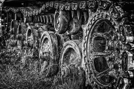 grayscale photo of continuous track of vehicle thumbnail