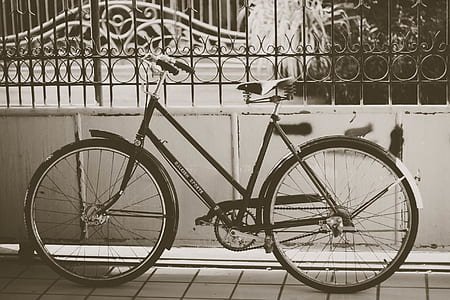 grayscale of photography of step-through bike thumbnail