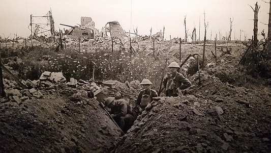 grayscale photography of soldiers at battlefield thumbnail