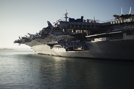 gray steel battle ship on body of water thumbnail