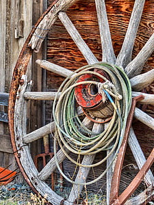 rope tied on carriage wheel thumbnail