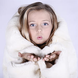 girl wearing white fur coat thumbnail