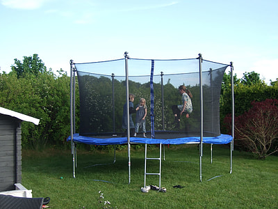 three children playing on trampoline thumbnail