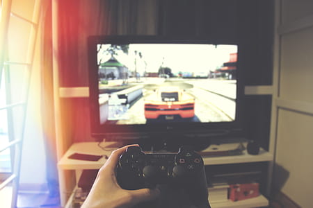 person playing Sony PS3 thumbnail