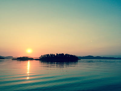 photography of sea during sunset thumbnail