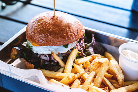 Delicious fresh homemade burger with fries thumbnail