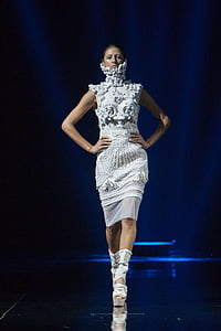 woman walking on runway thumbnail