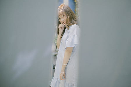 woman wearing white dress thumbnail