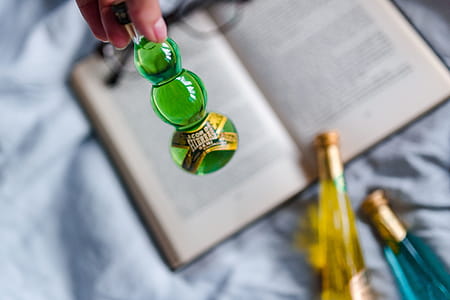 Group of colorful little bottles with liqueurs thumbnail