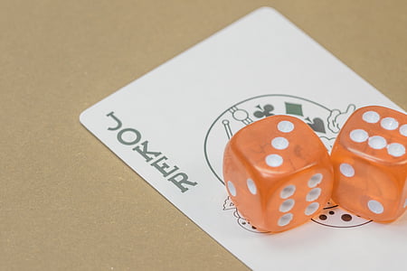 two dice and joker playing card thumbnail