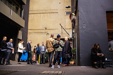 group of people standing near black and brown bracelet thumbnail