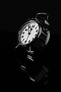 white and black table alarm clock thumbnail