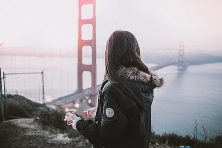 woman staring at the bridge thumbnail