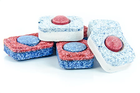 six red-blue-and-white ornaments on white surface thumbnail