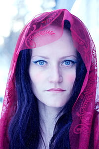 woman wearing red headdress thumbnail