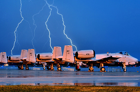 white aircraft during thunder thumbnail