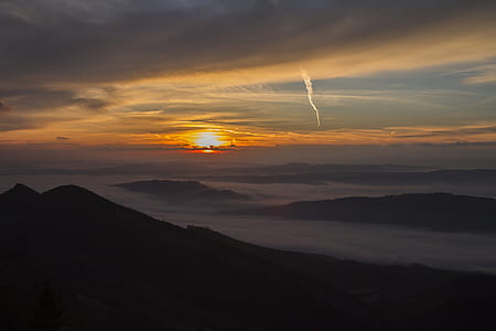 silhouette of mountain during golden hour thumbnail