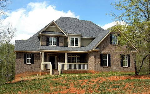 gray concrete house thumbnail