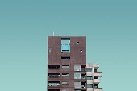 brown and beige high-rise building thumbnail
