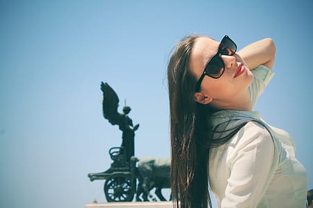woman wearing black sunglasses with black frames thumbnail
