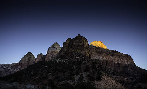 yellow camping tent on mountain during daytime thumbnail