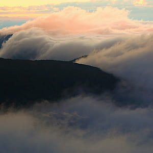 mountain surrounded by clouds thumbnail