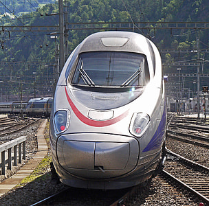 gray metal train on track thumbnail