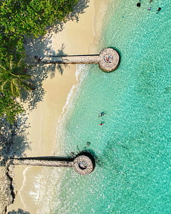 aerial view of shore during daytime thumbnail