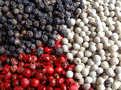 stack of red, white, and black seeds thumbnail